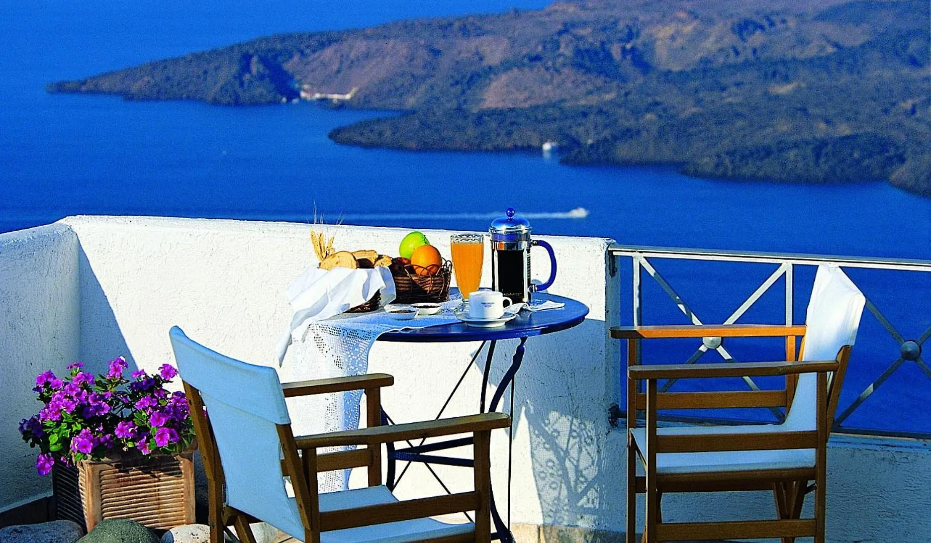 4 Central Hotels In Fira That Deliver On Caldera Views